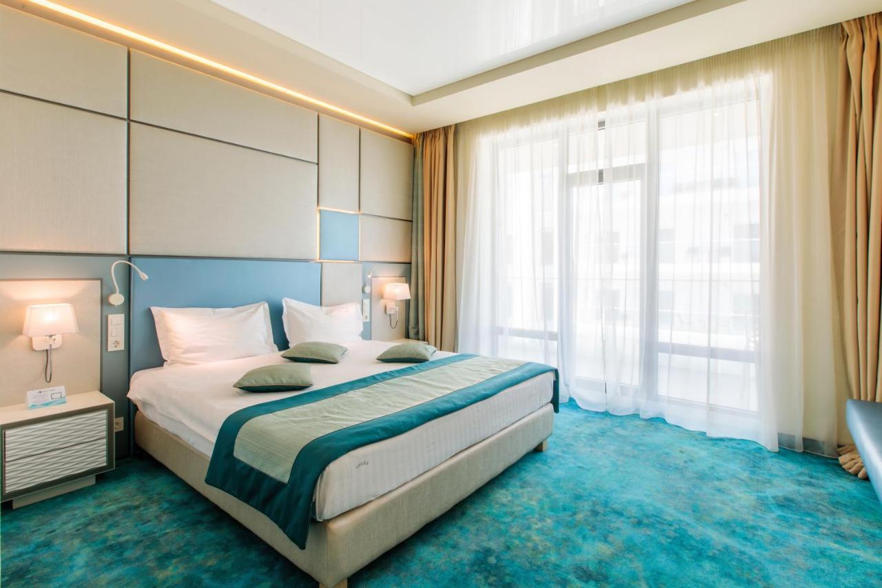 Chambre Double Deluxe - Vue Partielle sur Mer